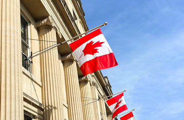 Canadian flag on building